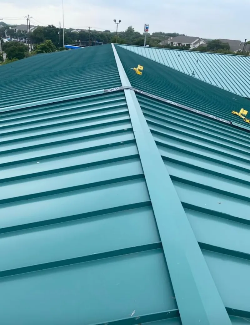 Green commercial metal roof ridge and valley for Metal Roof Repair in Purcellville