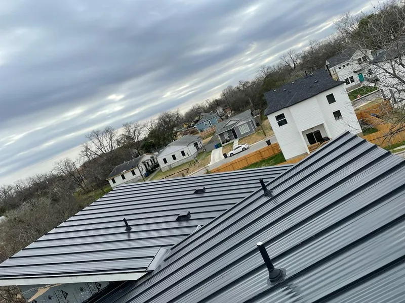 Standing seam metal roof panels with vents for Skylight Repair in Purcellville